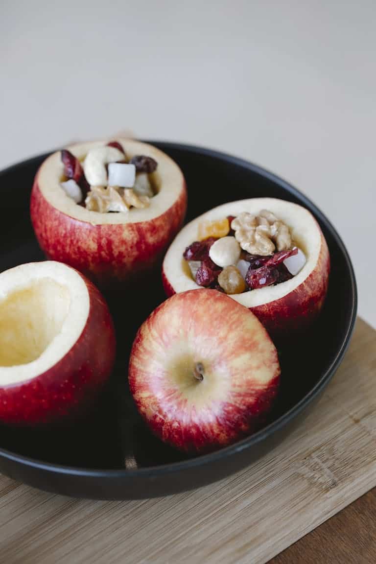 Delicious baked apples filled with nuts and dried fruits, perfect for a healthy homemade dessert.